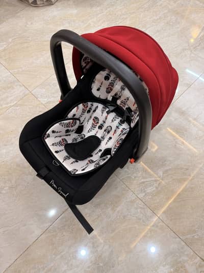 Mothercare’s baby carry cot (mom squad)