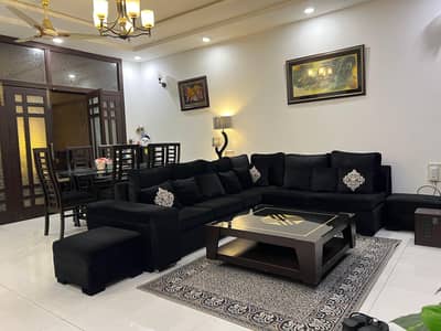 L shaped sofas black colour