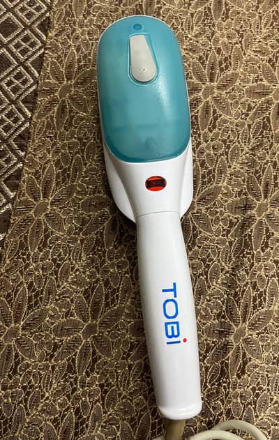 Tobi company water steam iron