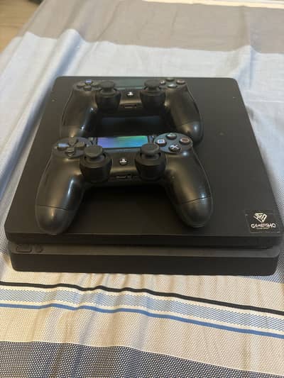 Playstation 4 Slim 500 GB with 2 controllers