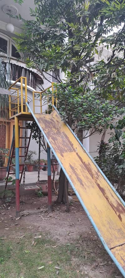 Slide with swing