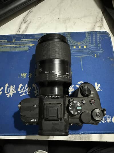 Sony A7iv with 35mm sigama lens like brand new condition