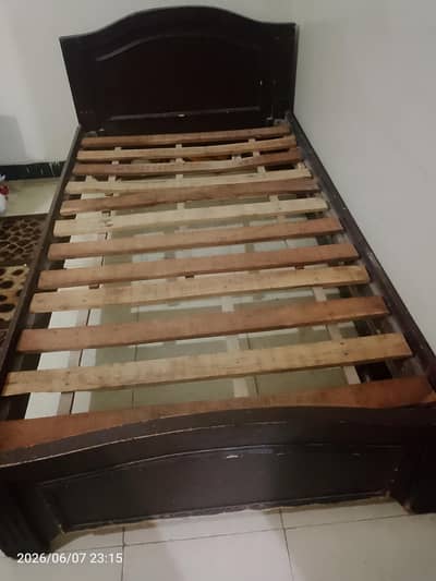 wooden single bed