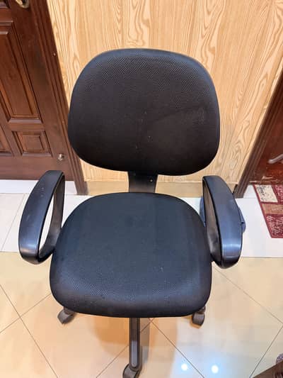 Revolving chair with ups and down feature