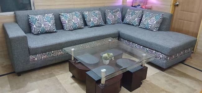 L shape sofa with center table