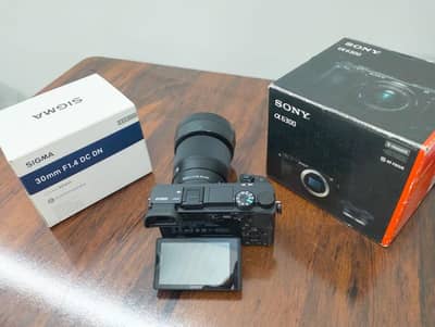 URGENT SALE SONY A6300 WITH LENSE  SIGMA 30mm 1.2