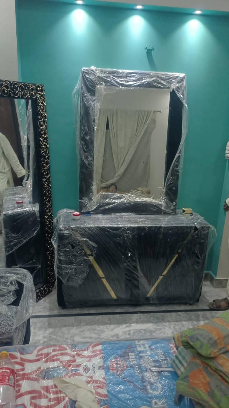 bed with 2 side table and dressing 1