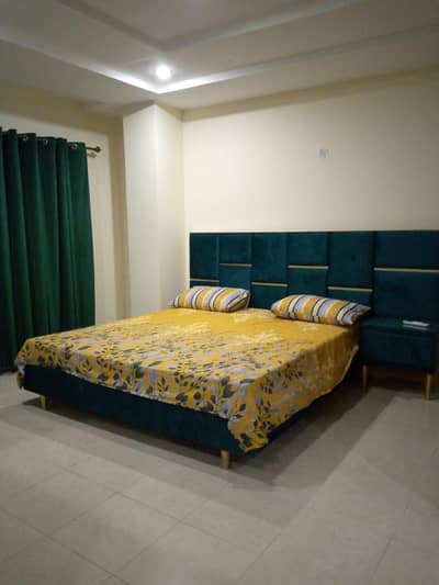Par Day and short Time One and Two BeD Room appaertment Available for rent Bahria Town Phase 4 and 6 Empire Heights 2 family apartment any time available