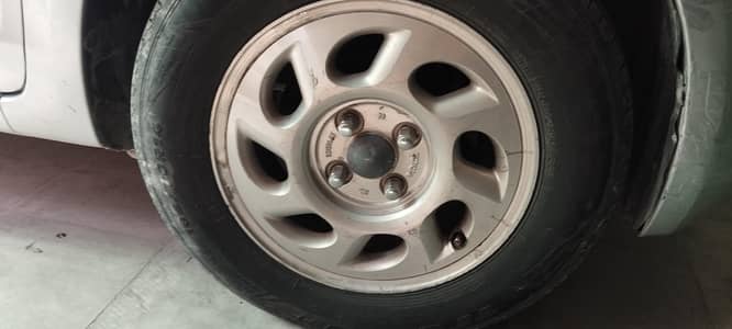Original Toyota 14 inch alloy rim.