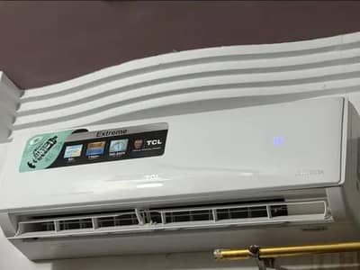 Tcl 1.5 ton Dc inverter heat and cool totally genuine good condition
