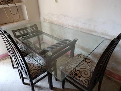 Glass dining table with 6 chairs