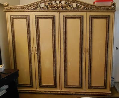 Bedroom set, cupboards, side tables, coffee table and chairs.