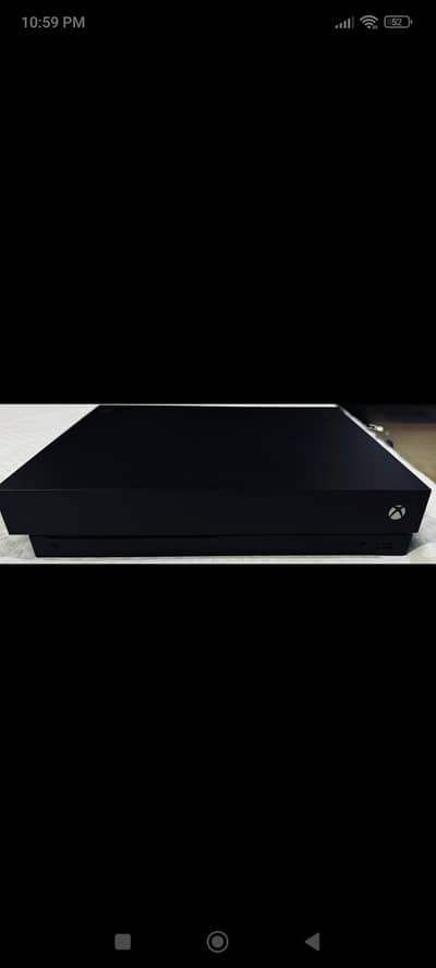 XBOX ONE X with 2 controllers and 2 cds (serious buyers)