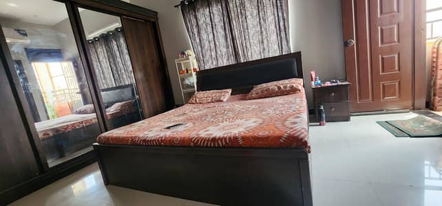 bed with mattress and 1 side table