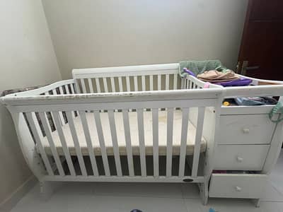 Selling this wooden cot