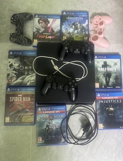 PS4 Slim 1TB with two original controllers & 7 exciting games