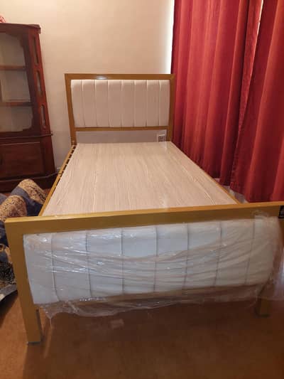 Iron bed golden and white completely new