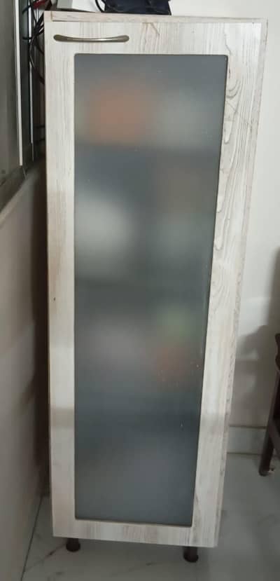 kitchen cupboard with glass shelves