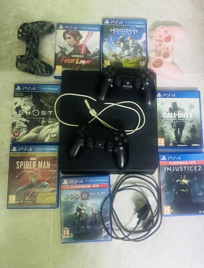 PS4 Slim 1TB with two original controllers & 7 exciting games