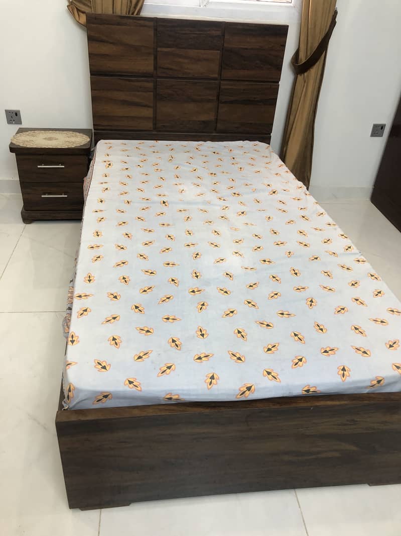 Single bed and side table 0