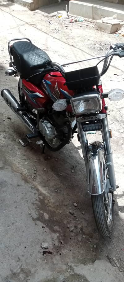 Honda 125 (red colour)