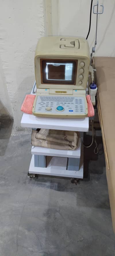 Japanese ultrasound Machine in used with probe with ultrasound trally