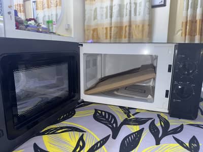 Candy microwave oven new ( unused )