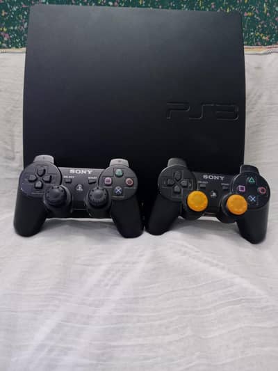 sony playstation 3 slim 320 gb jailbreak with 2 wireless controllers