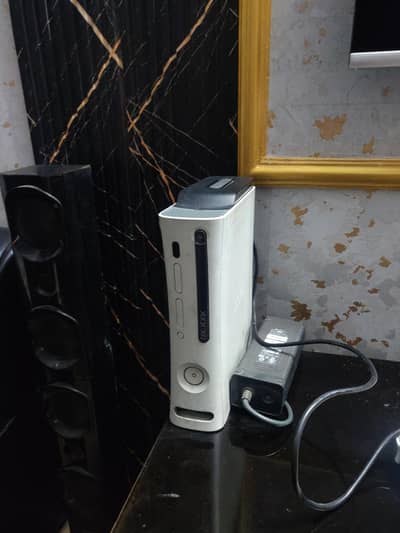 Xbox 360 available for sale in good working condition.