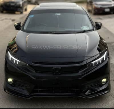 Civic top of line UG leathers+navigation 2017 modified fully