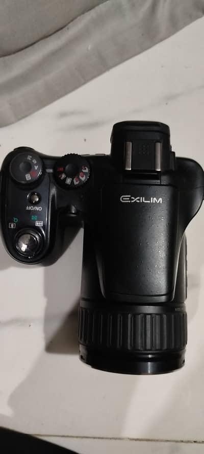 This is a Casio Exilim EX-F1 bridge camera, featuring a prominent "EX