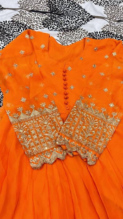 Beautiful Orange dress available in reasonable price