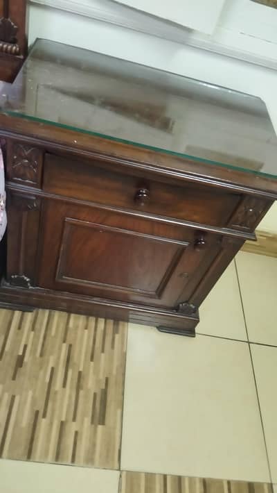 king size bed with 2 side tables.