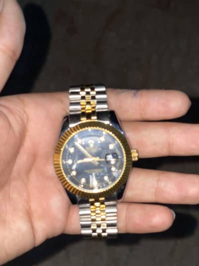 Rolex Men’s watch with day and dates