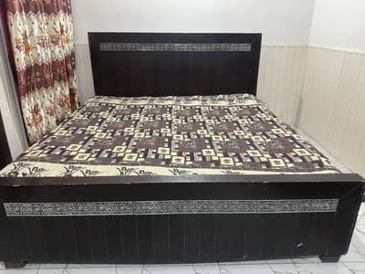 Bed with spring mattress in used