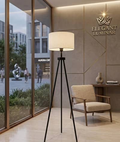 Metal tripod lamp.