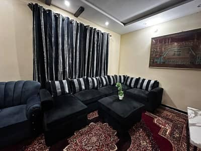 L shaped 8 seater with puffy