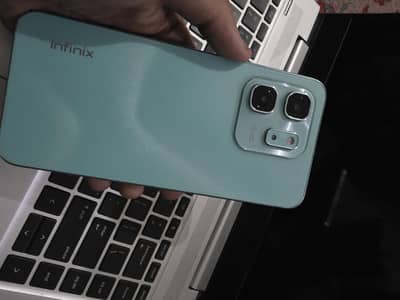 Infinix Hot 50i with original box and adapter