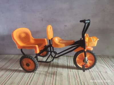 kids 3 wheel bicycle orange colour