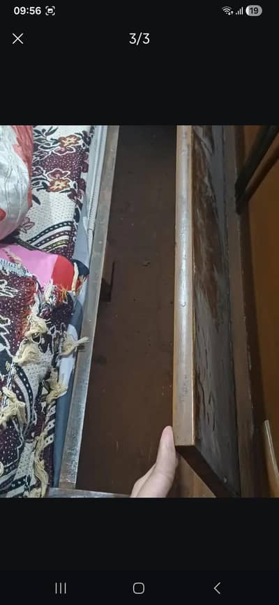 Wooden bed 8/10 condition. first come first basis
