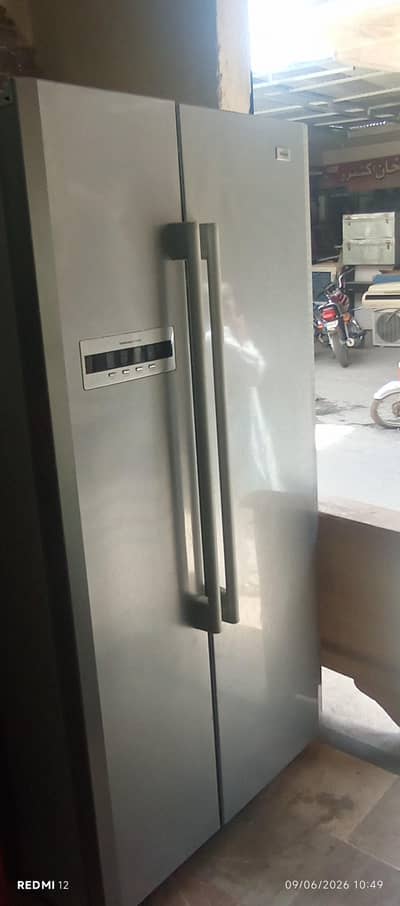 brand new hair double door computerize pridge condition 10 by 10 .