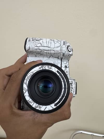 Canon Eos R camera with 50mm rf lens 3 batteries, bag & stap