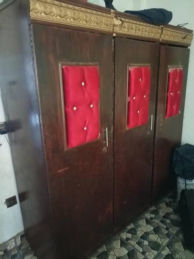 Three door wood cabinet