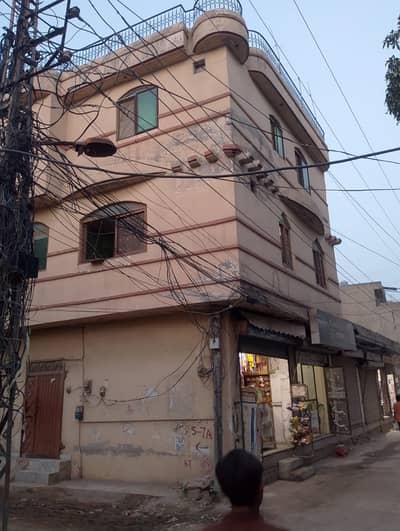 Corner 2 Marla Building In Hassan Town Is Available For sale