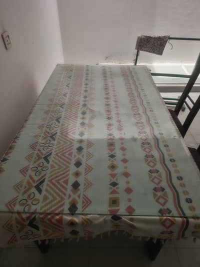 table set with glass top and 6 chairs