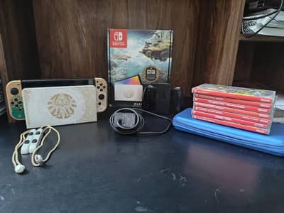 Nintendo Switch OLED | Special Edition (Legends of Zelda} + games