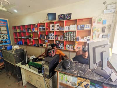 Mobile shop & Repairing Center for sale, Zakriya Town st#32 Main Road