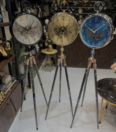Momentum Dial Tripod Base Luxury Designer Clock With Moving Gear. . .