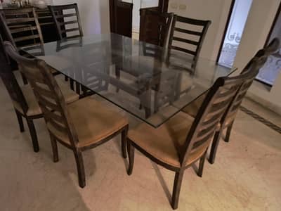 Glass dining table - eight executive chairs