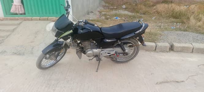 Honda 125 delux model 12 and condition is like 24 for urgent sale